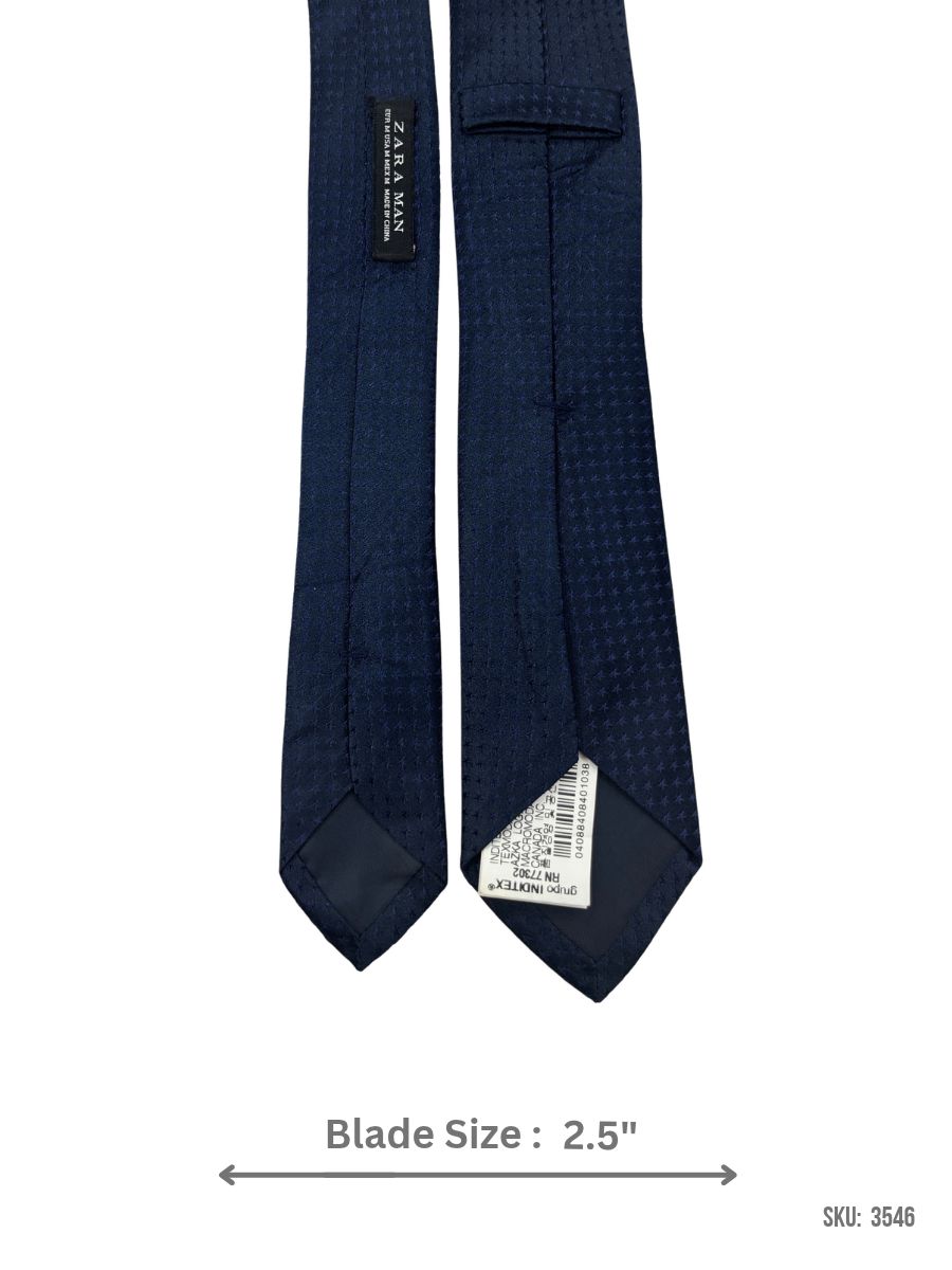 3546-2 Navy blue slim tie with tonal micro star pattern – back view showing label