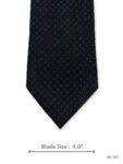 Black silk tie with white micro dot pattern – front blade view