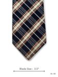 Navy blue tie with tan, cream, and white plaid pattern – front blade view