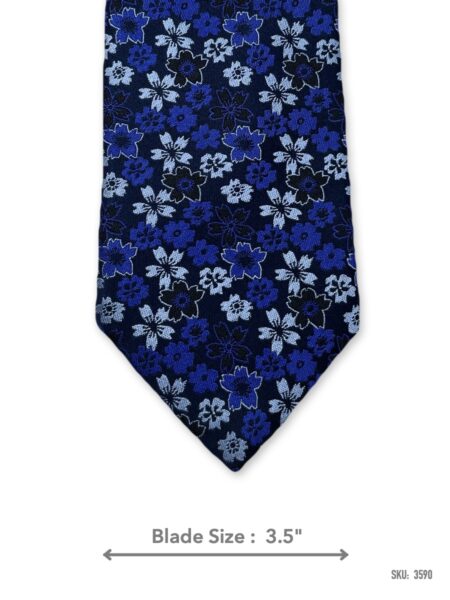 Navy blue silk tie with royal blue and light blue floral pattern – front blade view